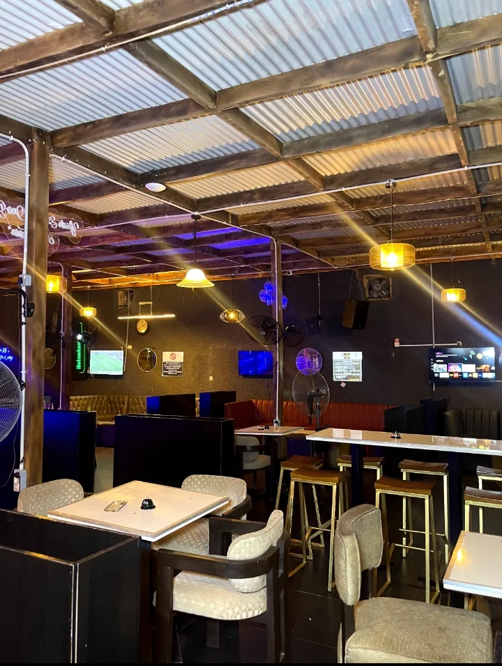 The bar counter and high stools on the Blinkx terrace